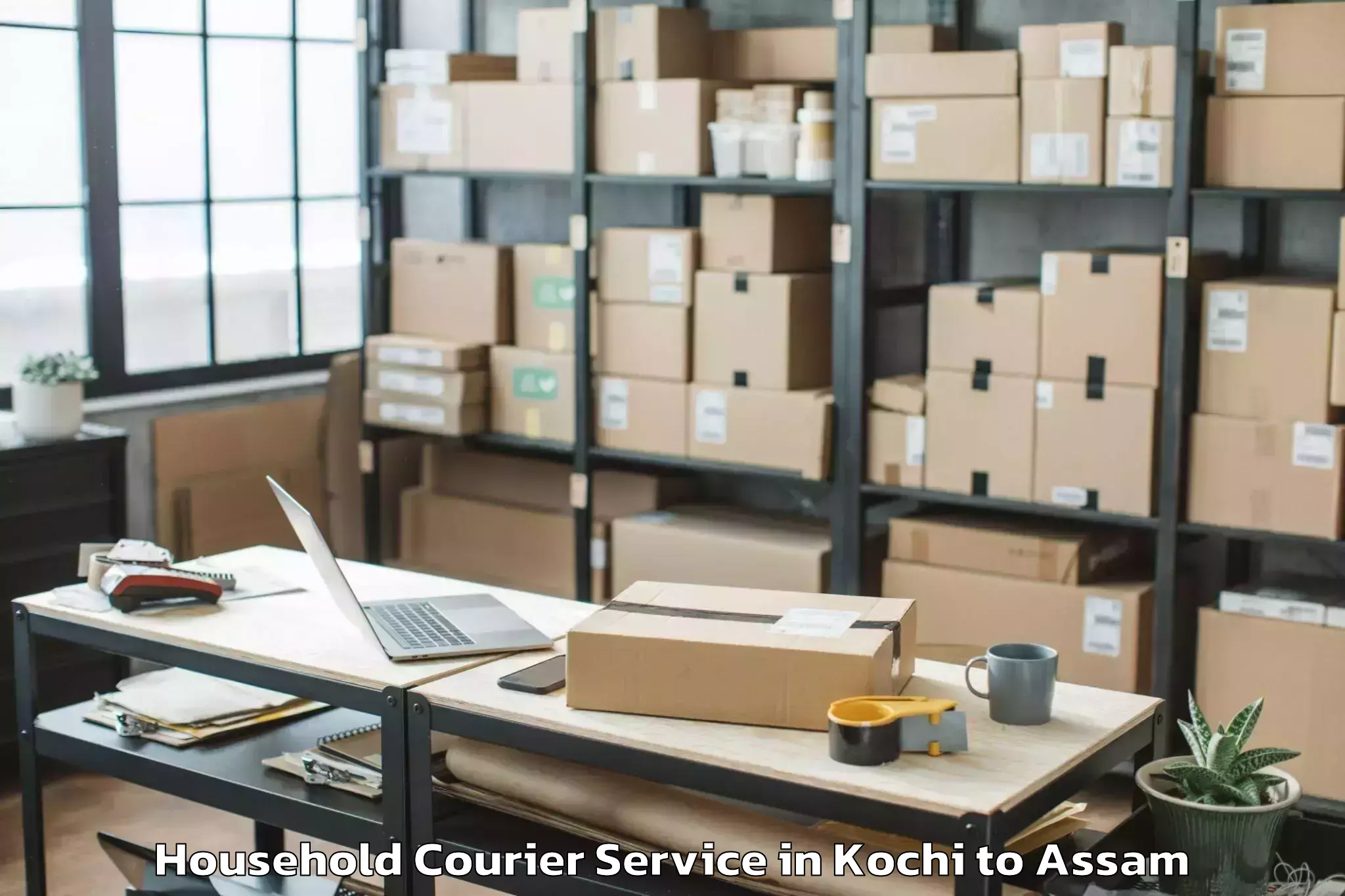 Reliable Kochi to Dibrugarh University Dibrugarh Household Courier